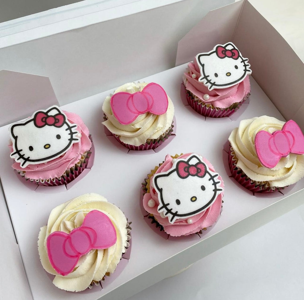 Hello Kitty Edible Icing PRE-CUT 5cm (width) Cupcake Toppers – House of  Cakes